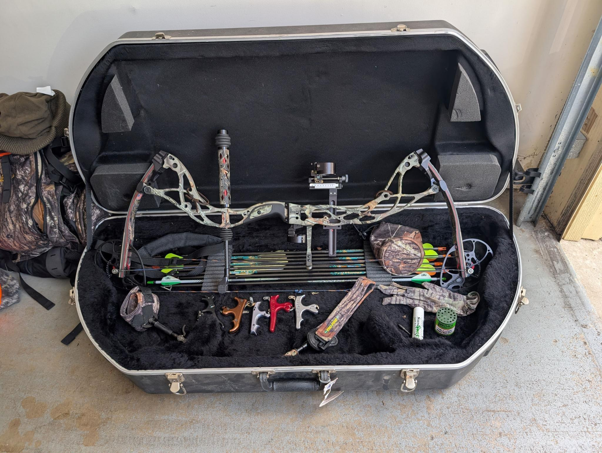 1.	Bowtech bow, case, accessories